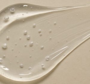 Niacinamide serum smeared on neutral palette